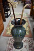 A vintage papier mache stick stand of vase form, height approx. 67cm and two sticks