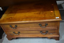 A low cupboard television stand or coffee table