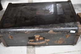 A vintage hard bodied travel case with Blue star line cabin badge