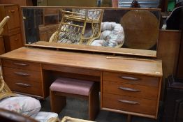 A vintage G plan or similar dressing table with stool, width approx. 170cm