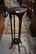 A reproduction stained frame plant stand, height approx. 103cm