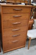 A vintage G plan or similar six drawer chest having extra deep bottom drawer, dimensions approx. W64