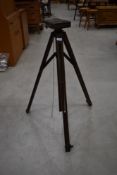 A vintage fold away wooden surveyors or architects tripod for theodolite/similar ideal for lighting