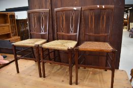 Three matching Edwardian mahogany and inlaid bedroom chairs, probably Maple & Co, with a variety