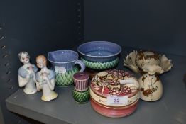 A variety of ceramics including two vintage half dolls, A Lancaster pottery trinket pot, and some