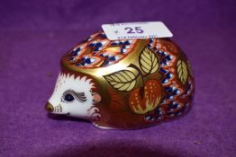 A Royal Crown Derby paperweight Orchard Hedgehog with gold stopper
