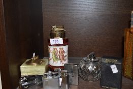 A selection of vintage and modern desk to and pocket lighters including Zippo and Ronson.