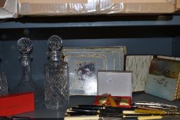 Two Waterford crystal decanters and similar Webb Corbett, also a selection of vintage place mats and