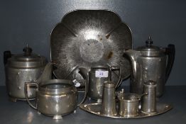 An interesting collection of vintage pewter ware including Tudor rose shaped dish,cruet set, tea/