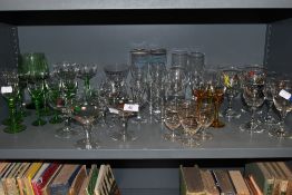 A collection of vintage glasses, various styles and colours.