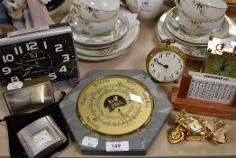 A selection of vintage and retro alarm clocks and mantel clocks.