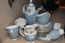 Around twenty three pieces of Royal Doulton Rose Elegans having blue and white ground and floral