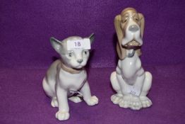 A pair of Lladro Nao figurines, Seated Dog and Cat