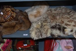 A selection of ladies vintage furs, hats and accessories.