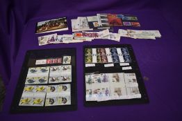 A collection of GB Stamps including High Value Blocks of Four, Presentation Packs and Stamp