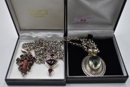 Three silver pendants of Artisan style having garnet, coral and green/red paste stone decoration