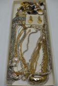 A selection of costume jewellery including necklaces, pendants, cufflinks, etc