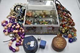 A Bluebird confectionery tin modelled as a chest containing a selection of costume jewellery