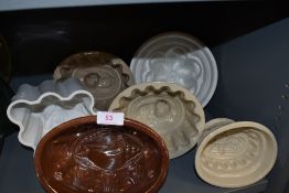 A selection of ceramic and earthen ware jelly moulds all in good condition