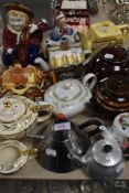 An assortment of quirky vintage and retro tea pots,jugs and similar, including