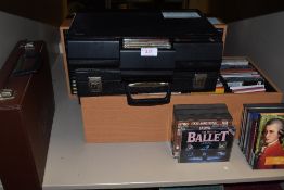 Two compact disc units with Jazz related compact disc and cassette collection.