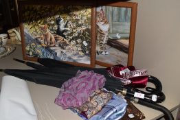 Two cat tea trays, a variety of vintage headscarves and umbrellas.