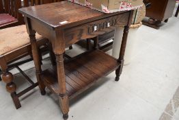 A priory style side table with integral drawer by Webber furniture