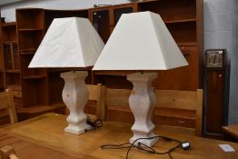 A pair of modern oversized table lamps (one having crack to one side)