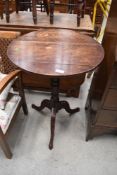 A 19th Century mahogany occasional pedestal table on triple splay legs, top marked and split,