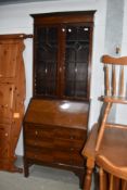 An early 20th Century mahogany bureau bookcase