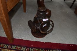 A vintage cast bottle or similar truck jack