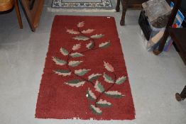 A vintage rug, wool, naturalistic design, approx. 138 x 72cm