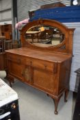 An early 20th Century golden oak mirror back sideboard, width approx. 138cm