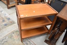 A mid century teak tea trolley, G plan or similar design