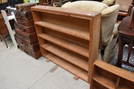 A vintage bookshelf, dimensions approx. W110cm D15cm H96cm