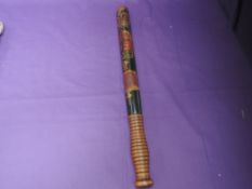 A ceremonial police truncheon bearing arms and French motto, MP in shield length 46cm