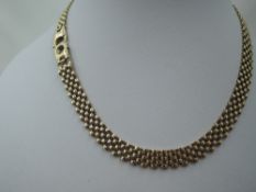 A 9ct gold four row brick link collarette, approx 16' & 25g