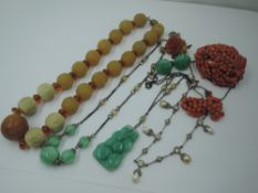 A small selection of vintage costume jewellery including coral brooch with matched earrings (AF),