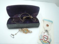 A yellow metal knot brooch having central turquoise, a pair of pincette glasses having rolled gold