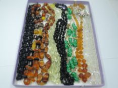 A small selection of vintage strings of beads of various forms