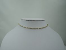 A yellow metal twist curb chain stamped 14K, approx 18' & 6g