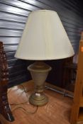 A modern table lamp, in a classical style