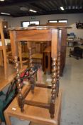 An Edwardian hall or side table having scalloped top with twist legs