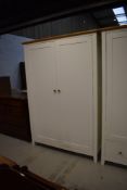 A modern laminate double wardrobe matt white with oak handles 51cm x 97cm x 190cm approx