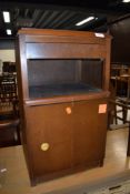 A mid century bed side cupboard