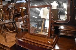 A Victorian mahogany toilet mirror, base width approx. 58cm