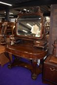 A Victorian style mahogany duchess dressing table, width approx. 122cm