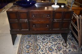 A mid century side board by EG (Gomme - early G Plan) in a dark stain H85cm x D45cm W120cm