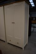 A modern laminate double wardrobe matt white with oak handles 51cm x 97cm x 190cm approx