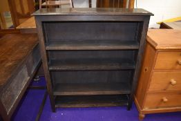A set of dark oak bookshelves, dimensions approx. W92cm H107cm D23cm